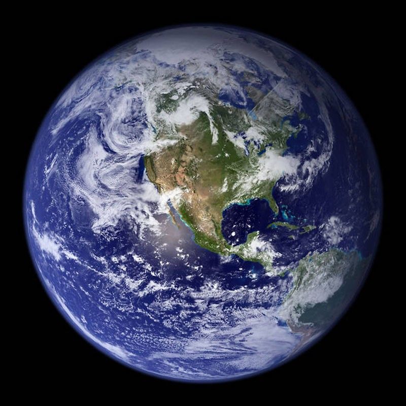 NASA’s Blue Marble composite shows Earth’s oceans, clouds, and the Americas.